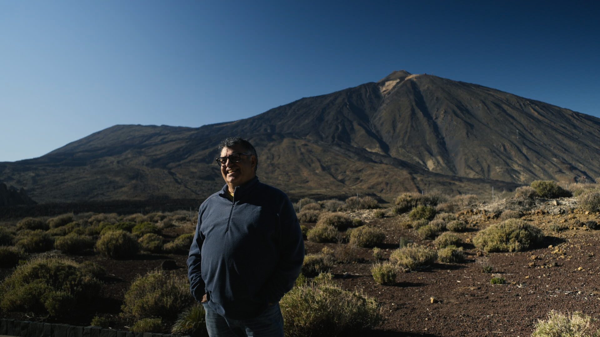 A figure before Mount Teide